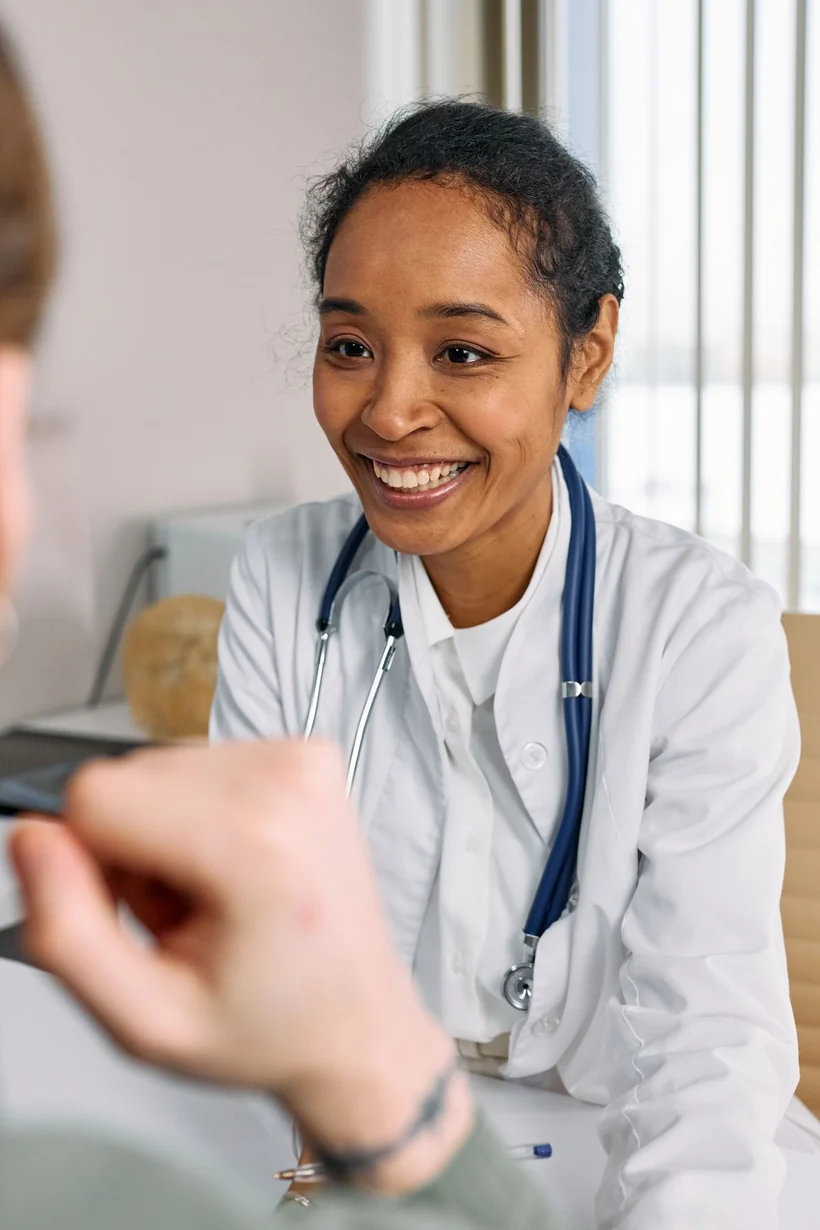 A licensed clinician reviewing a patient chart